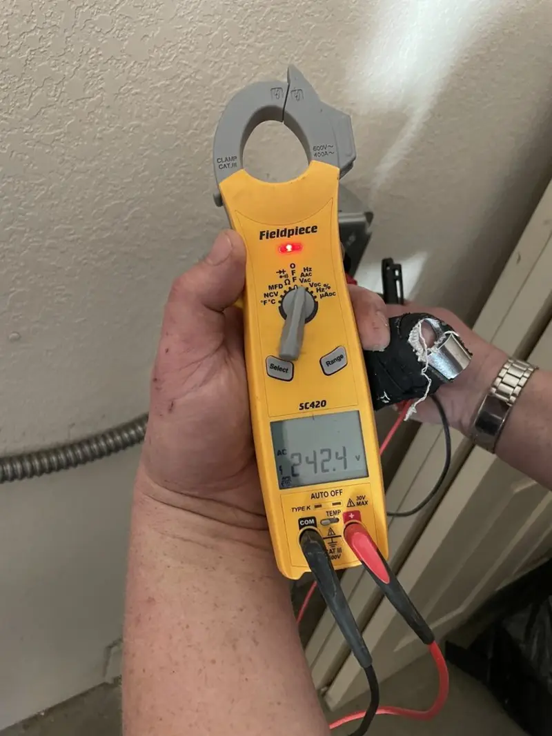 Voltage testing with clamp meter during Ceiling Fan Installation in Cape Girardeau